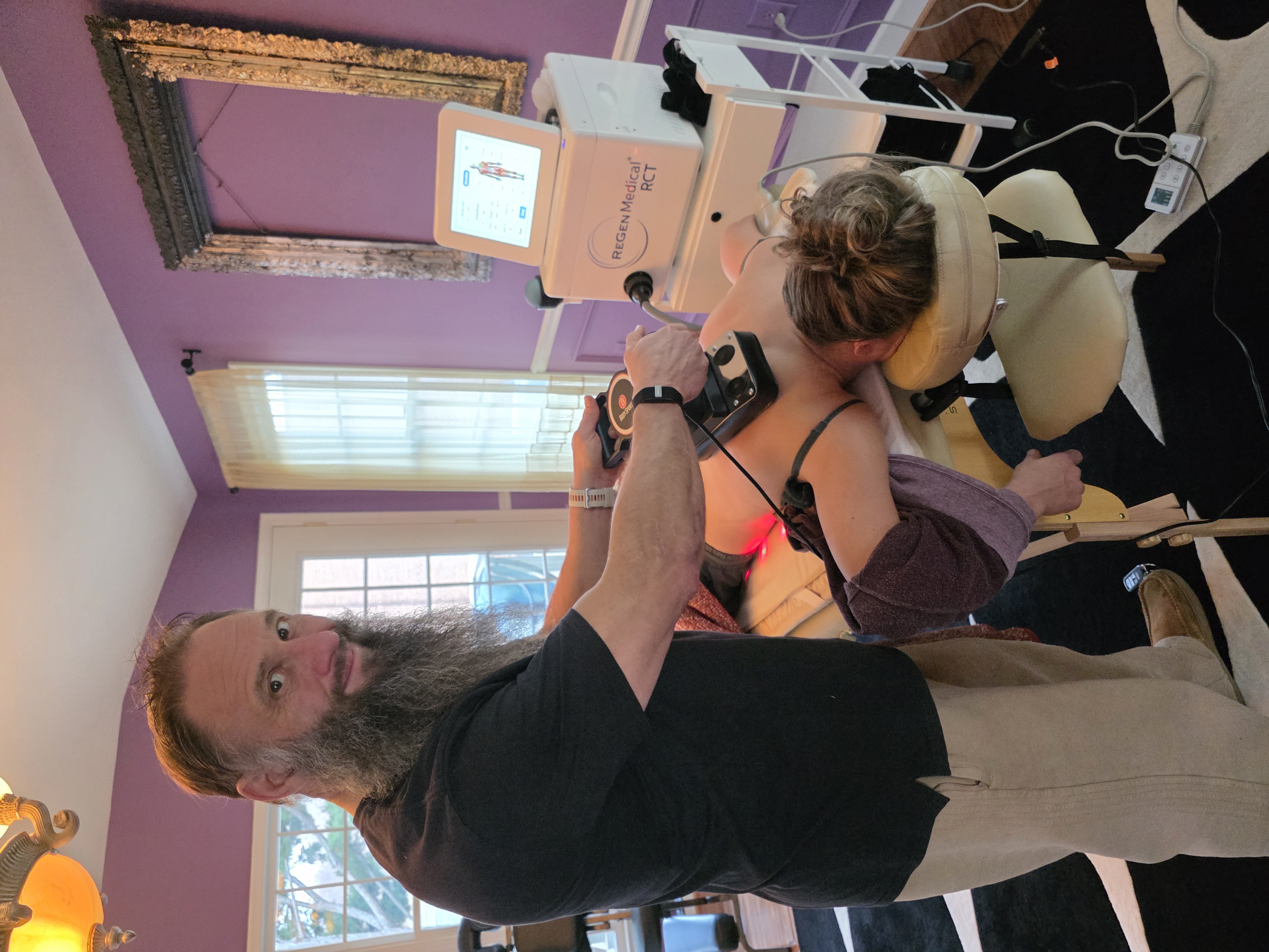 Patient receiving targeted shockwave therapy